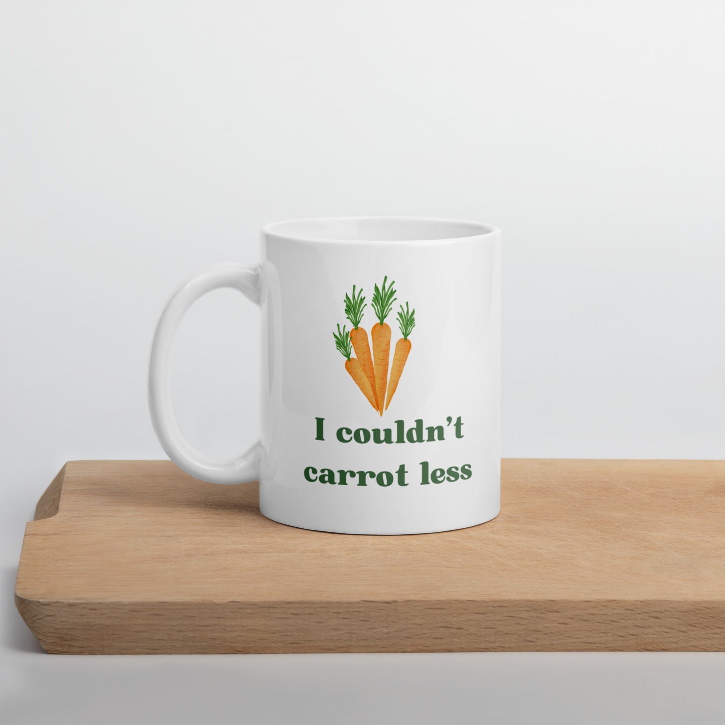 "I couldn't carrot less" mug