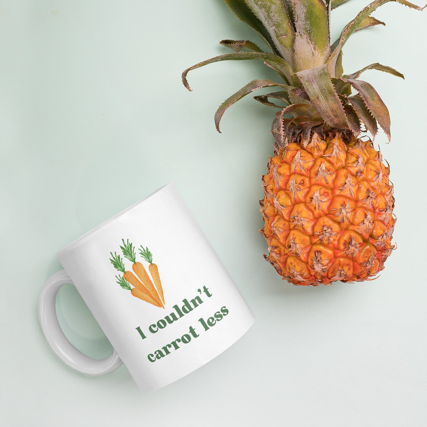 "I couldn't carrot less" mug
